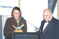 Lady Cock presenting a silver covered shofar to Lord Weidenfeld